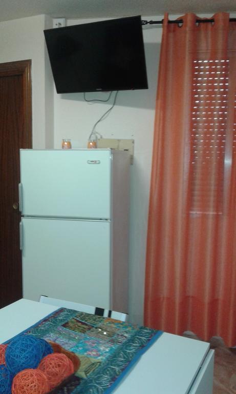 Comet Suites Almona Granada Quarto foto