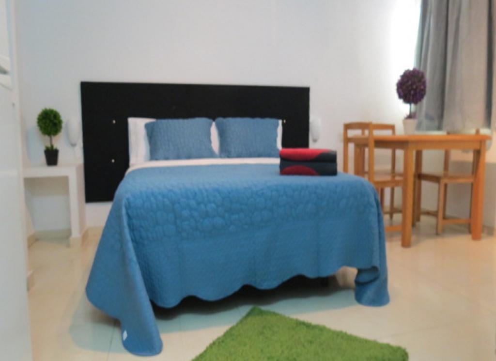 Comet Suites Almona Granada Quarto foto